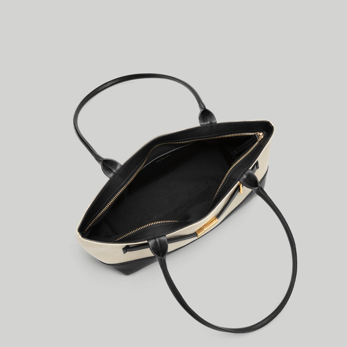 Exclusive The New York Shoulder — One Size — Size salt & pepper canvas black smooth — Back View